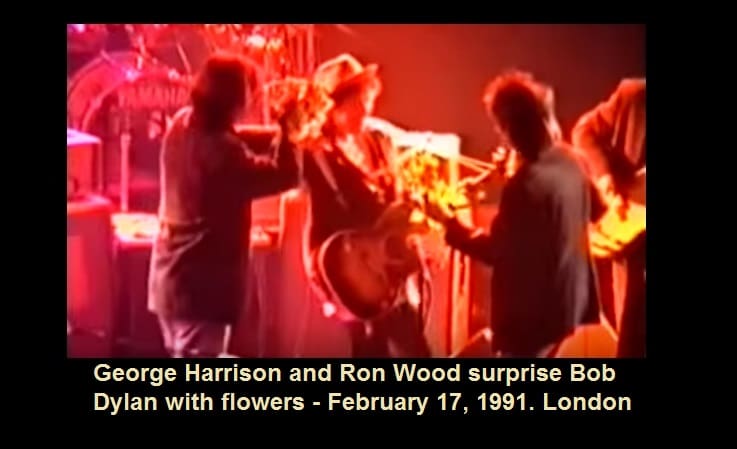 George Harrison and Ron Wood surprise Bob Dylan with flowers - February 17, 1991. London
