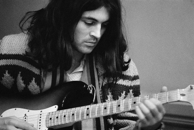 1971, Montreux, Switzerland --- Singer Ian Gillan of Playing Guitar --- Image by © Shepard Sherbell/CORBIS