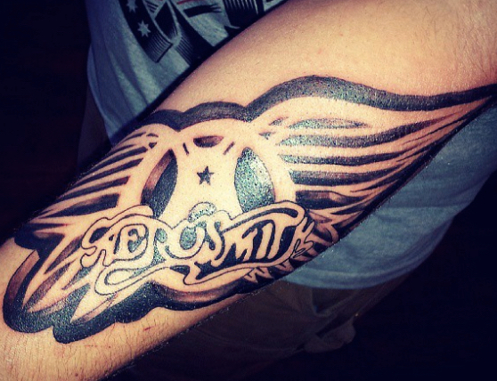 Aerosmith arm tattoo