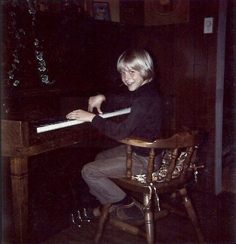 Kurt Cobain Childhood image, playing piano age 7