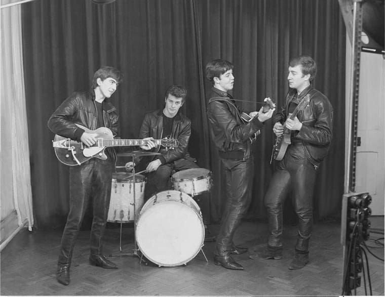 DECEMBER 17, 1961: The Beatles' first photo shoot. Pictured here are (L-R): George Harrison, Pete Best, John Lennon and Paul McCartney.