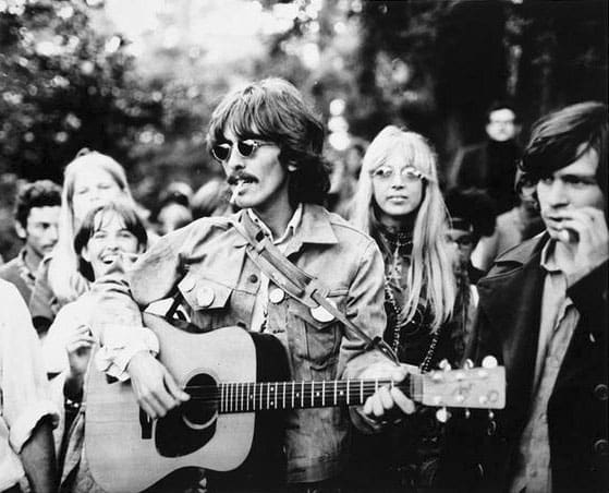 George Harrison playing guitar in Haight-Ashbury