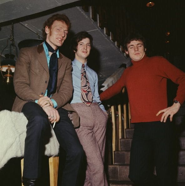 20 British rock group Cream posed in a London clothes shop in 1966.