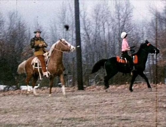 Elvis and Priscilla on their horses