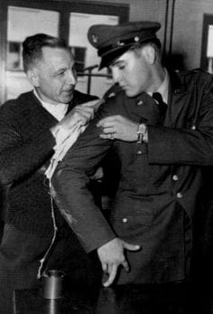 On his first day at the barracks in Germany on his arrival, Elvis rubbed up against a freshly painted doorway.