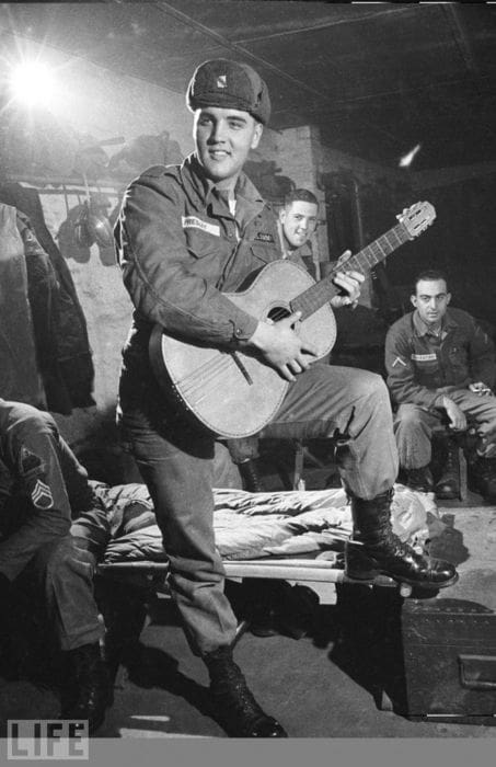 Private Elvis Presley entertains his tank battalion, Germany 1958.