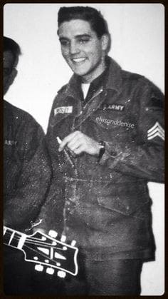 Elvis Presley Smoking a cigar…. army days