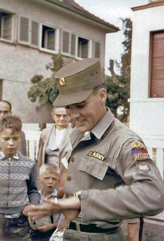 Specialist 4th Class Elvis Presley in front of his rented house at Goethestraße 14 in Bad Nauheim, Germany, 1959.