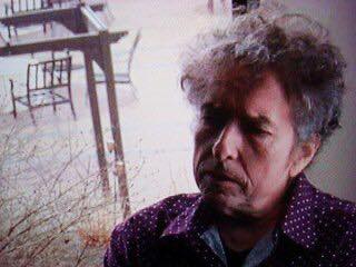 Legendary crooner Bob Dylan was once known for the shock of curly dark brown hair which adorned countless album covers. But as the recently posted below picture of Bob shows, the 69-year-old's hair follicles have made a Break Away (Blown' Away?) in recent years.