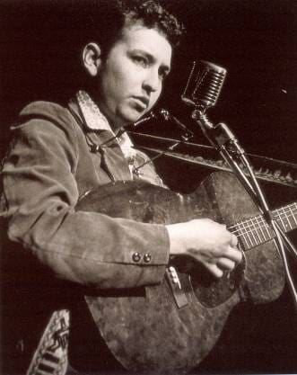 Dylan got to play five songs that first night. “House of the Rising Sun,” “Song to Woody,” “Talkin’ Hava Negeilah Blues,” and two others, identified only as “unknown Woody Guthrie song” and “a black blues,” according to New York magazine.