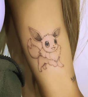 ariana grande eevee tattoo
