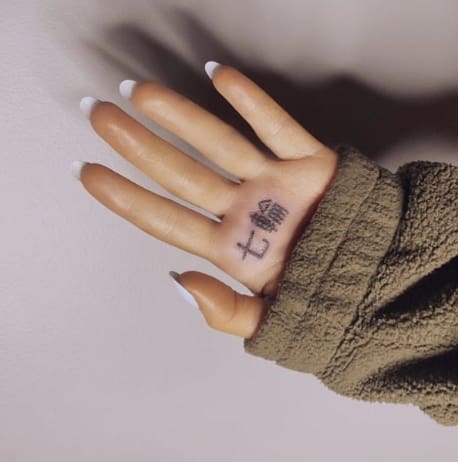 ariana grande hand tattoo japanese
