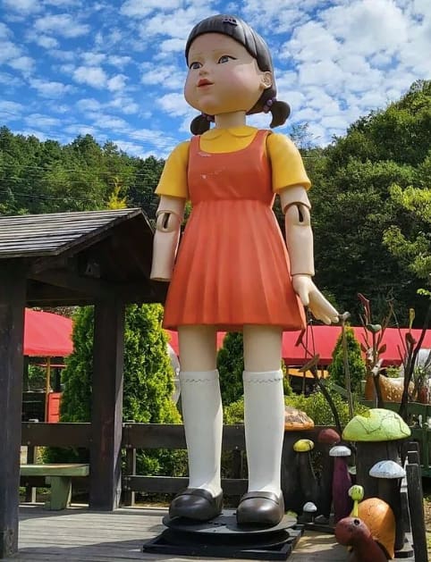 The giant doll in the red light-green light game is real. The doll is exhibited in a museum in Incheon but an arm is missing