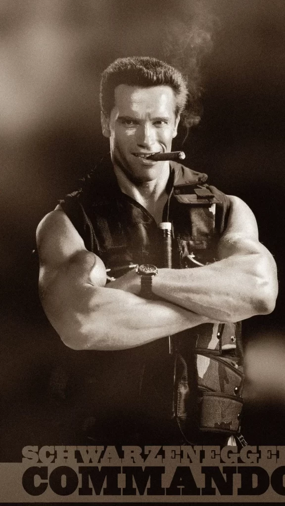 Arnold Schwarzenegger smokes cigars